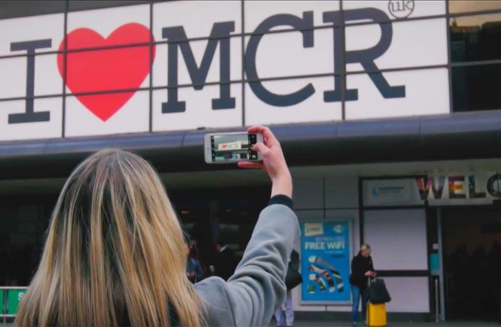 I Love MCR emblazoned on the entrance of Manchester Airport